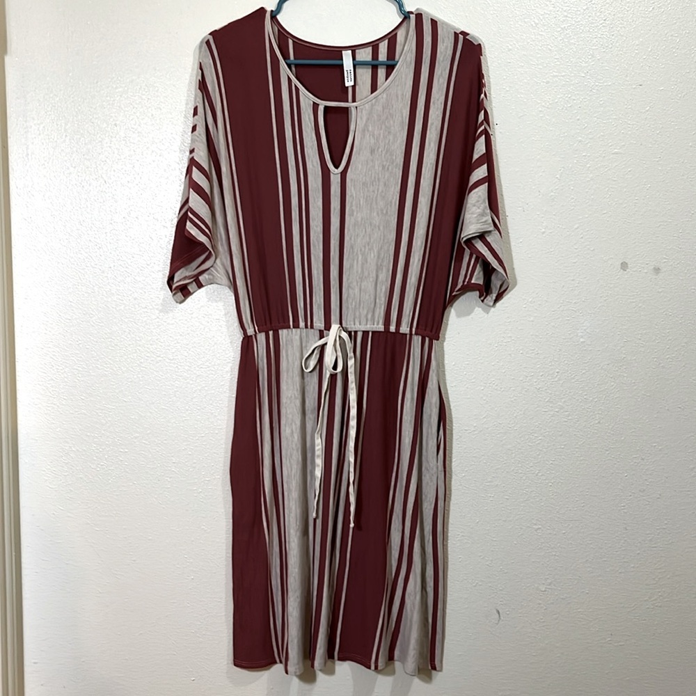 Native People short sleeved, cranberry and gray striped dress. Size Small.